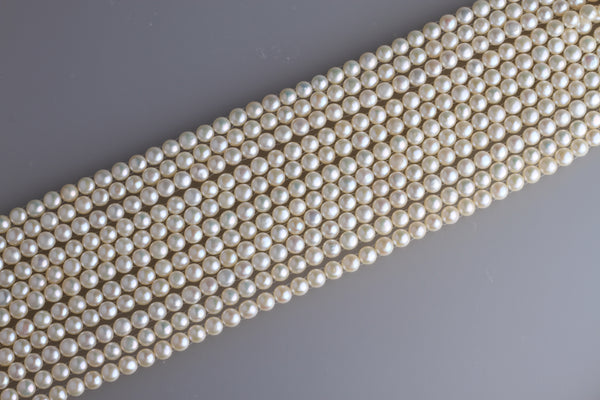 Two Hold Button Freshwater Pearl Strand 7.5-8mm