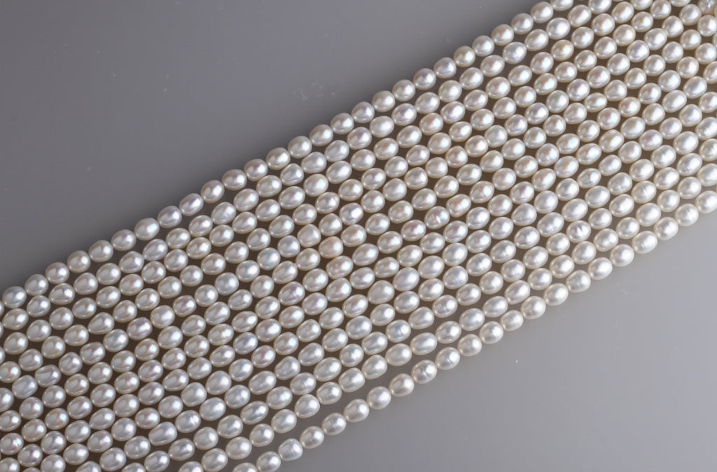 Oval Shape Freshwater Pearl Strand 7.6-8mm