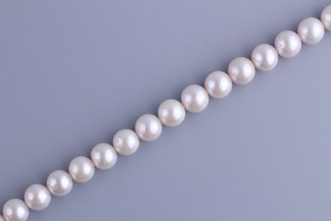 Round Pearl 10.5-11.5mm Luster: AA Shape: AAA Surface:  A
