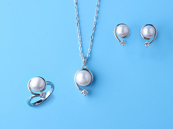 Sterling Silver Earrings with 7-7.5mm Button Shape Freshwater Pearl and Cubic Zirconia