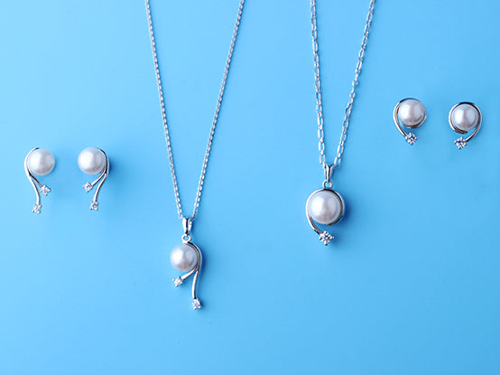 Sterling Silver Earrings with 7-7.5mm Button Shape Freshwater Pearl and Cubic Zirconia