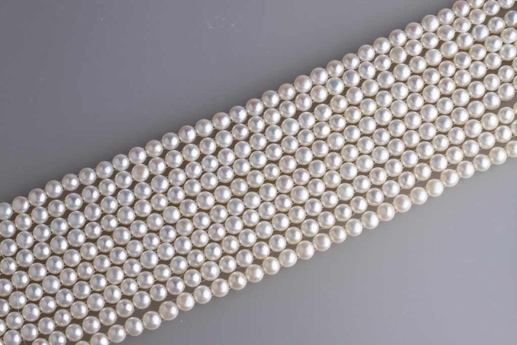 Two Hold Button Freshwater Pearl Strand 8-8.5mm