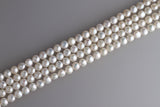 Two Hold Button Freshwater Pearl Strand 9.5-10mm
