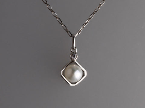Sterling Silver Pendant with 7.5-8mm Button Shape Freshwater Pearl and Cubic Zirconia
