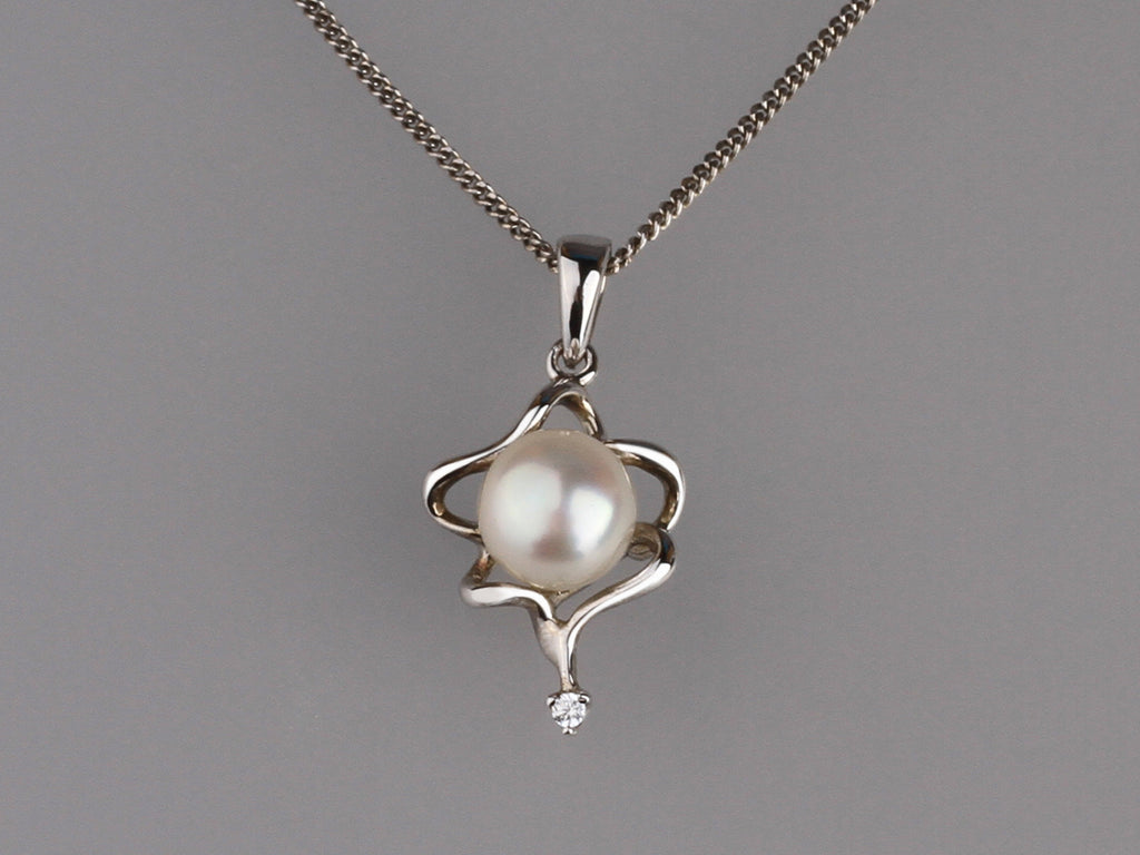 Sterling Silver Pendant with 7-7.5mm Button Shape Freshwater Pearl and Cubic Zirconia