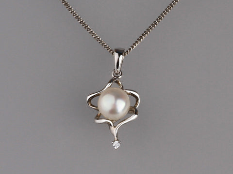 Sterling Silver Pendant with 7-7.5mm Button Shape Freshwater Pearl and Cubic Zirconia