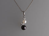 Sterling Silver Pendant with Button Shape Freshwater Pearl and Cubic Zirconia