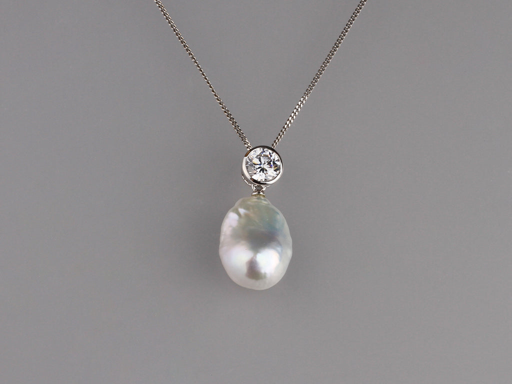 Sterling Silver Pendant with 12-12.5mm Baroque Shape Freshwater Pearl and Cubic Zirconia