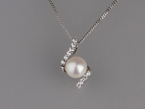 Sterling Silver Pendant with 7-7.5mm Button Shape Freshwater Pearl and Cubic Zirconia