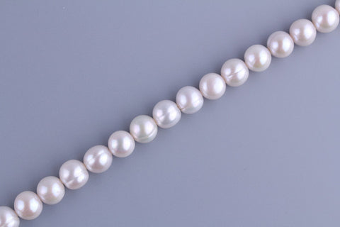 Round Pearl 10.5-11.5mm Luster: AA Shape: B Surface: B