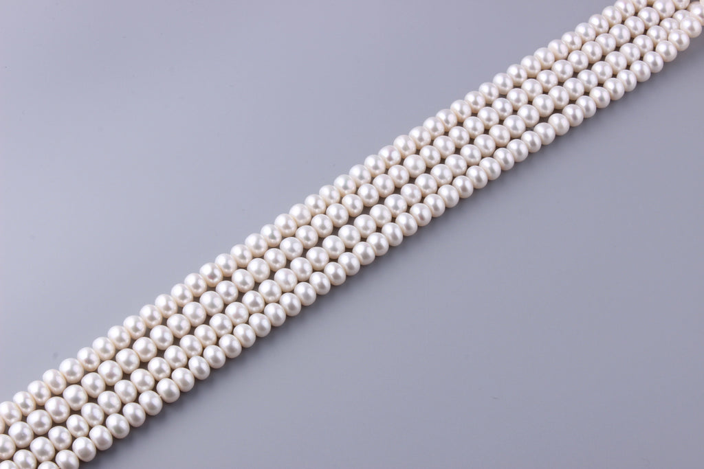 Roundel Shape Freshwater Pearl 9.5-10mm (SKU: 920708 / 1003071) - Wing Wo Hing Jewelry Group - Pearl Jewelry Manufacturer