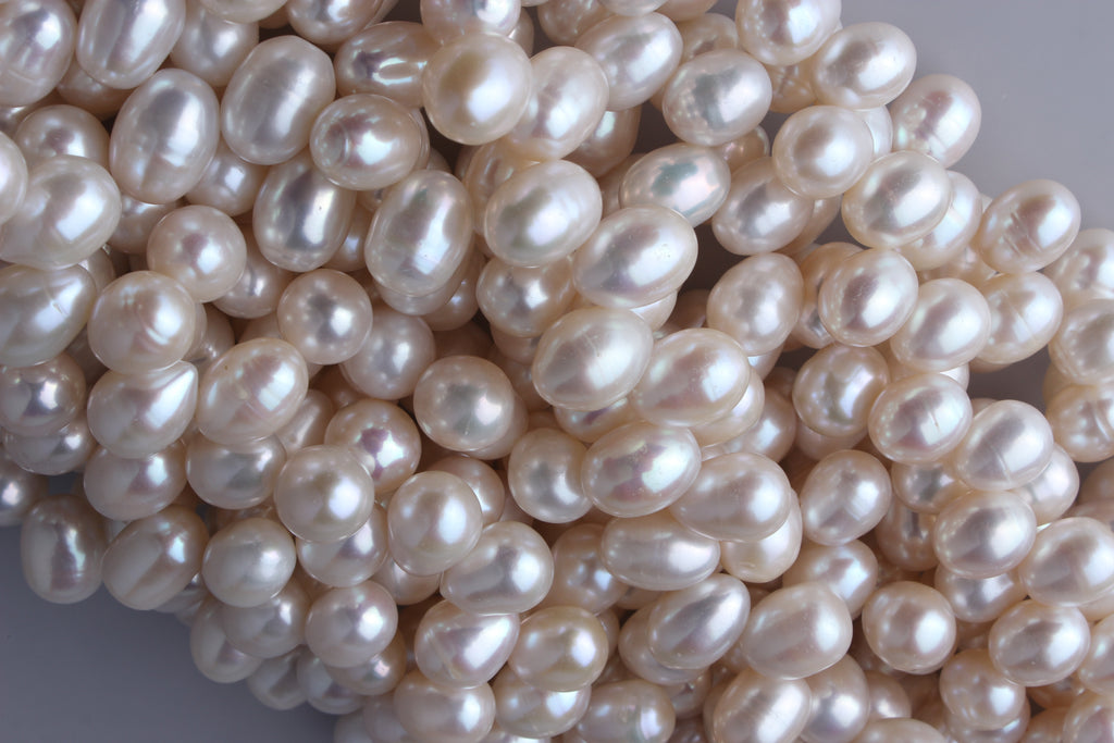Top Drilled Oval Shape Freshwater Pearl 9-9.5mm (SKU: 938008/1006418)