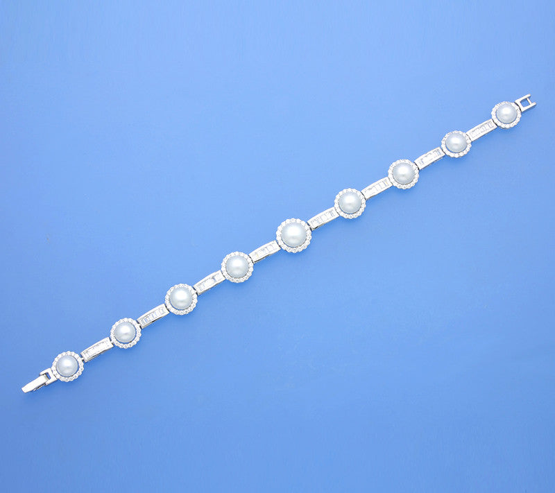Sterling Silver Bracelet with Button Shape Freshwater Pearl - Wing Wo Hing Jewelry Group - Pearl Jewelry Manufacturer